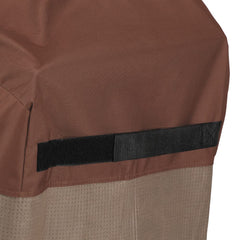 Duck Covers fire pit cover securely fitted on a round fire pit