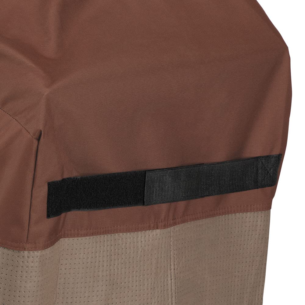 Duck Covers fire pit cover with rip-n-grip straps secured