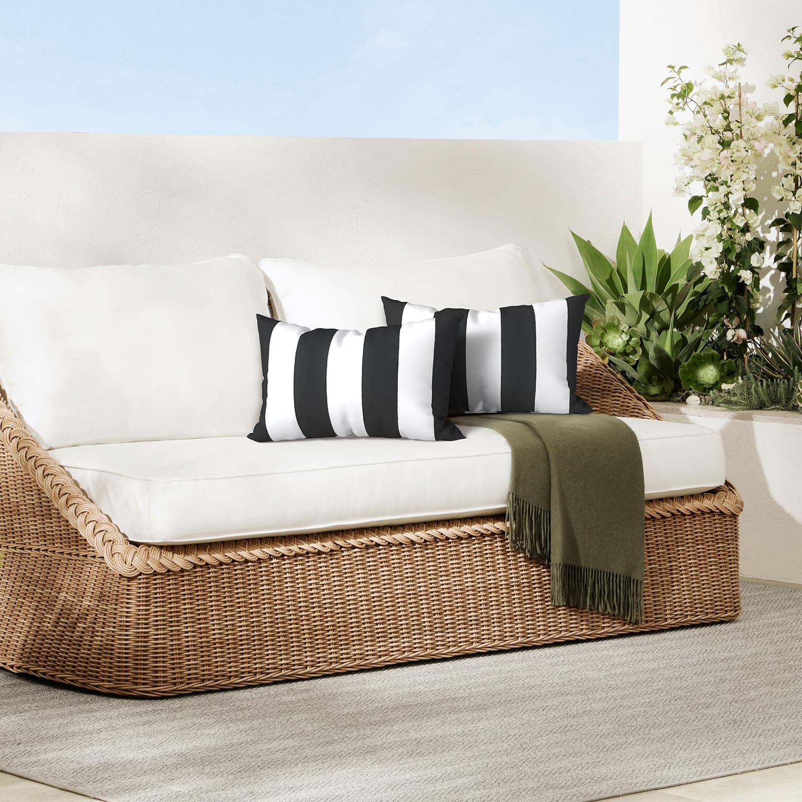 DYTXIII Outdoor Waterproof Lumbar Pillow Covers on a porch swing