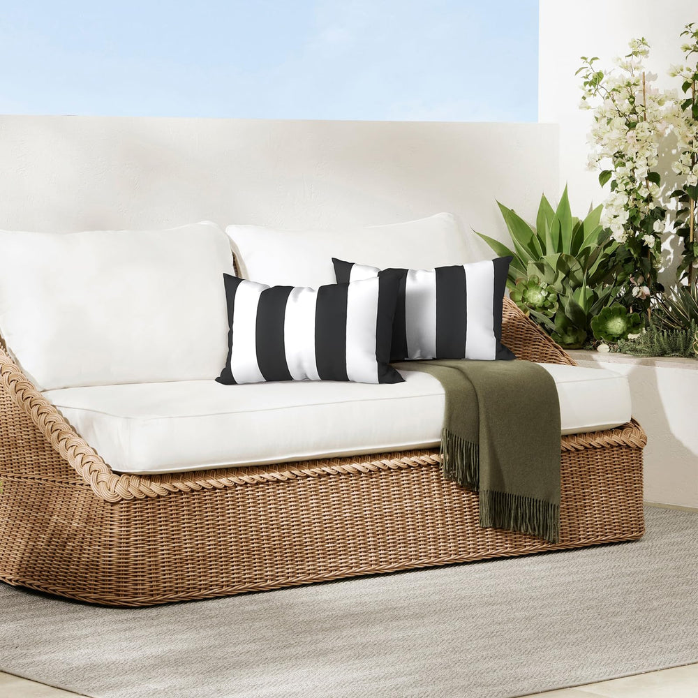 DYTXIII Outdoor Waterproof Lumbar Pillow Covers on a porch swing
