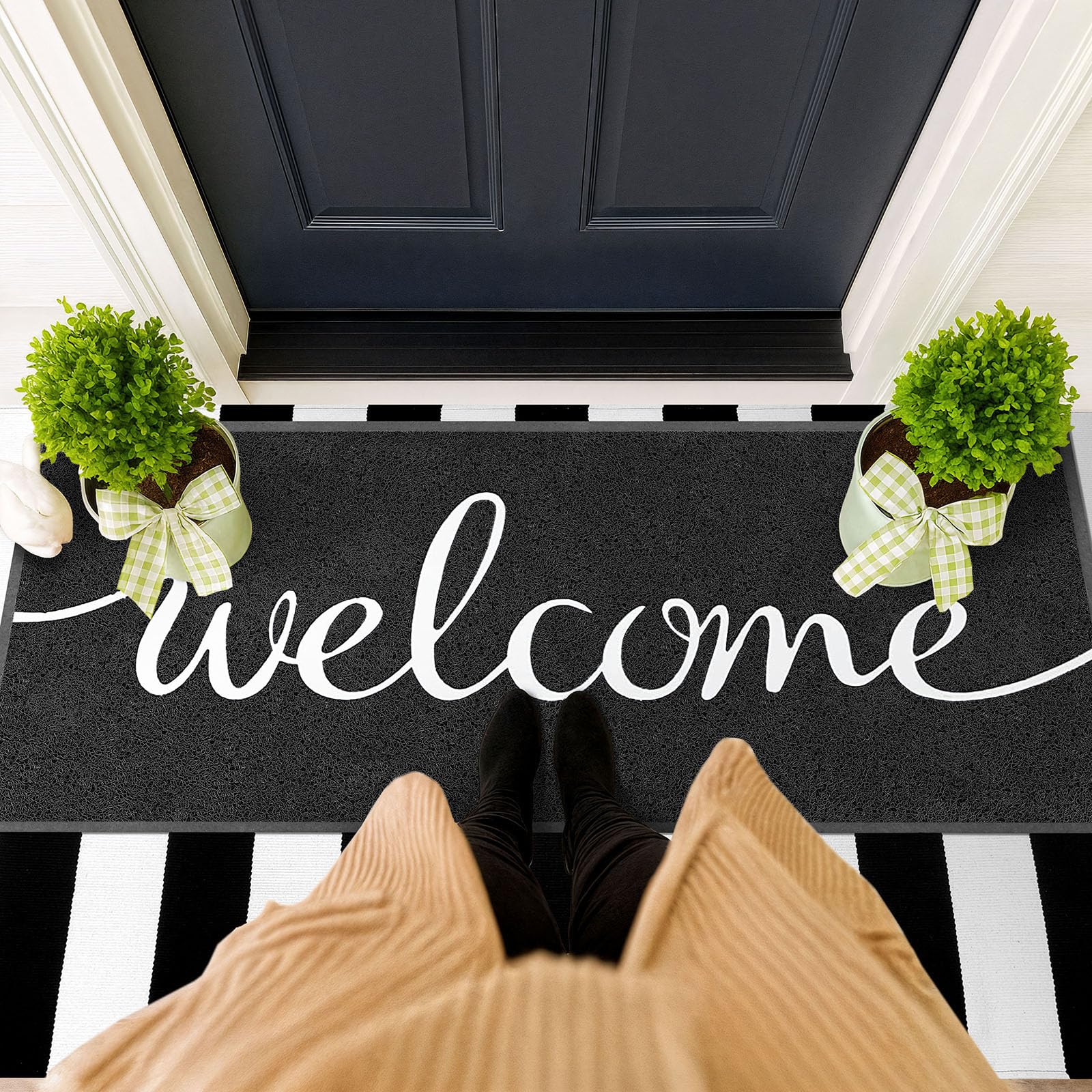 EARTHALL Funny Welcome Mat capturing dirt from shoes