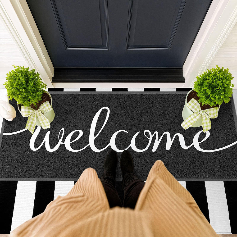 EARTHALL Funny Welcome Mat capturing dirt from shoes