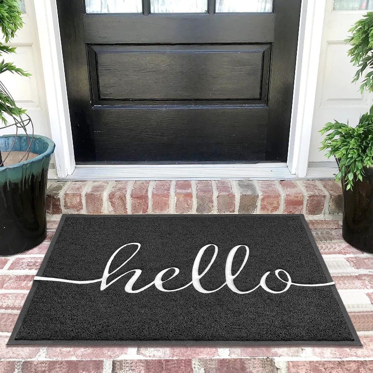 EARTHALL Hello Doormat front view, black with hello design