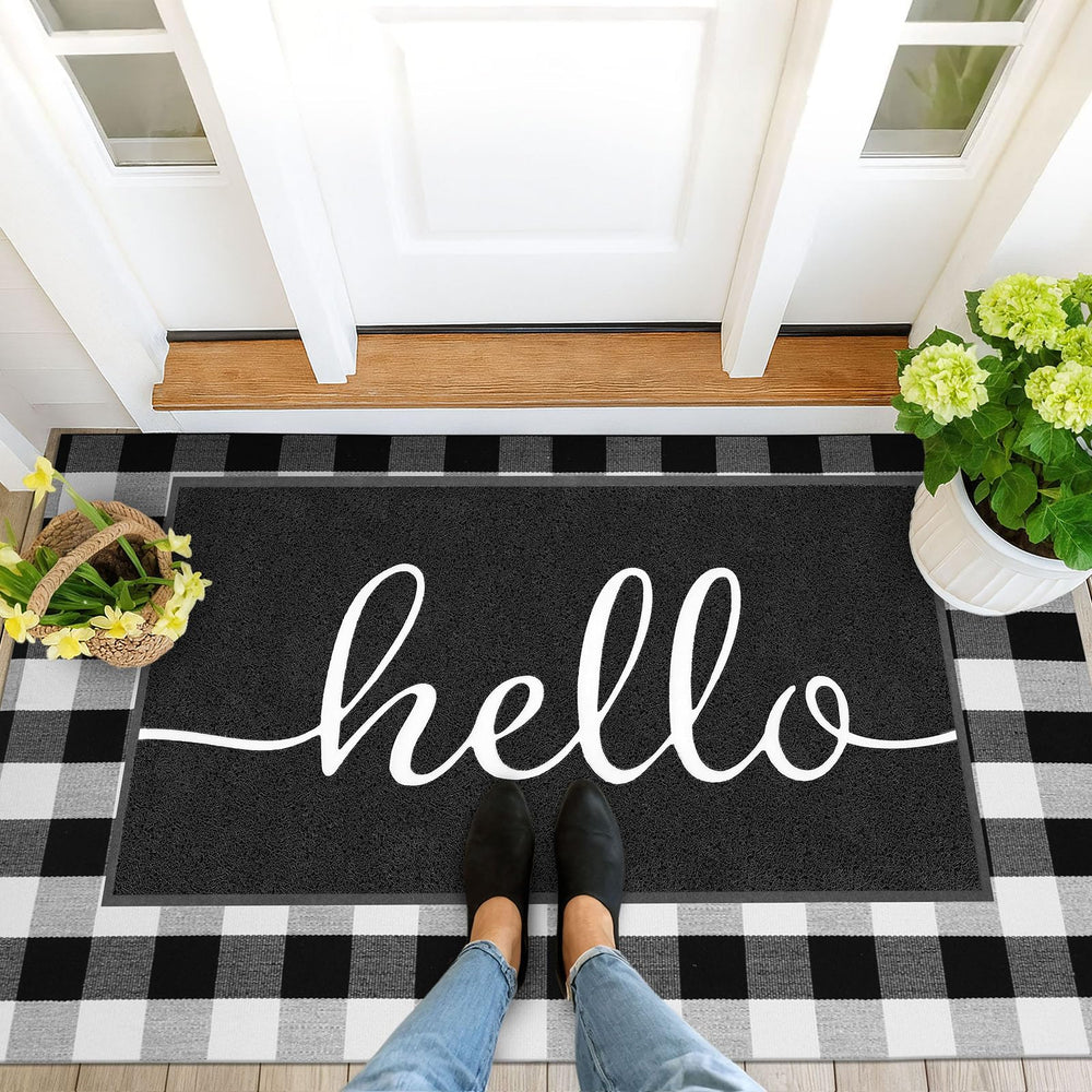 EARTHALL Hello Doormat in front of a house entrance