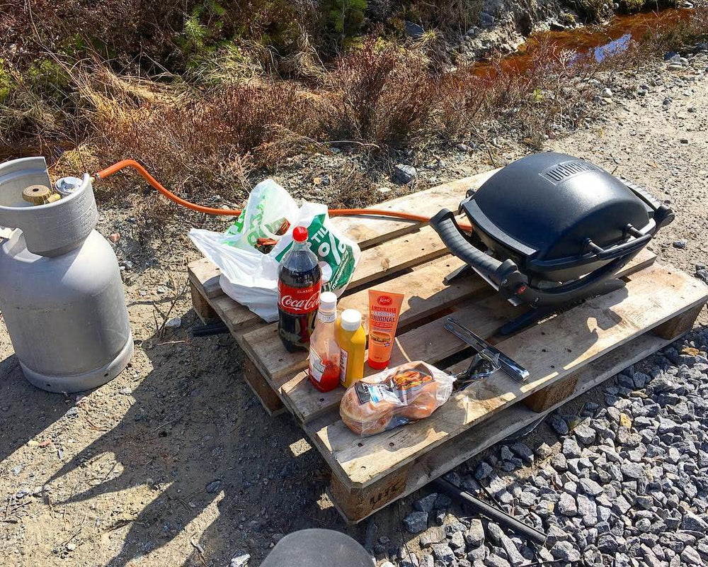 EasiBBQ Valve Regulator on a picnic table with grill setup
