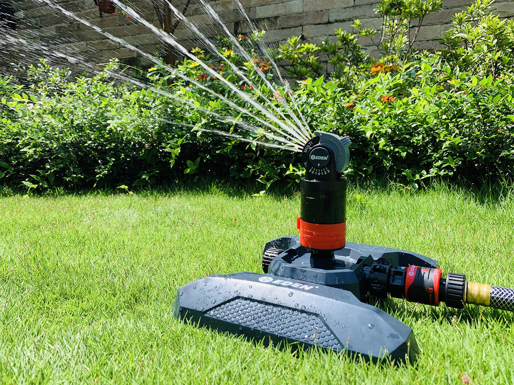 Eden Multi Pattern Turbo Gear Drive Sprinkler in garden setting