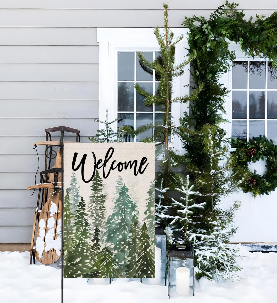 EKOREST Welcome Christmas Garden Flag in a festive outdoor display