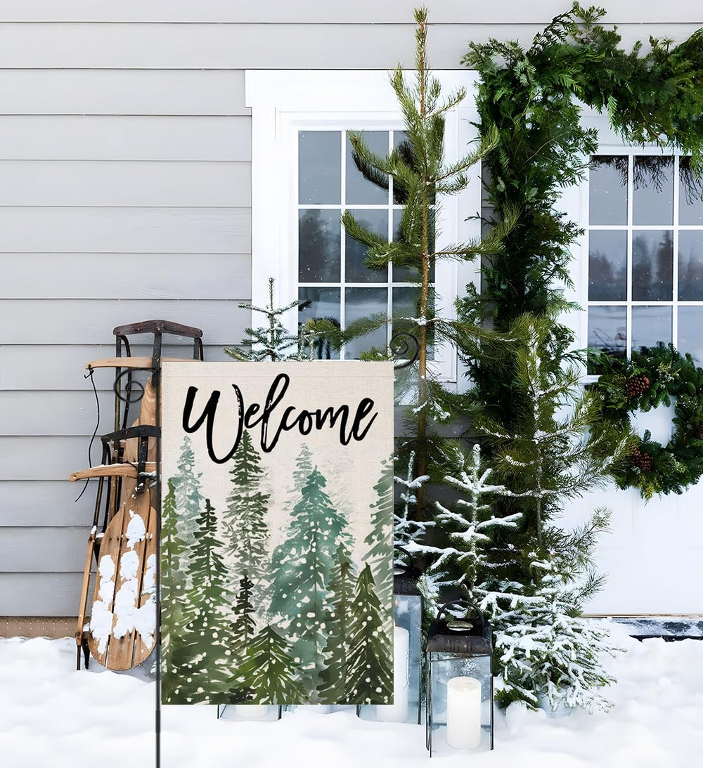 EKOREST Welcome Christmas Garden Flag in a festive outdoor display