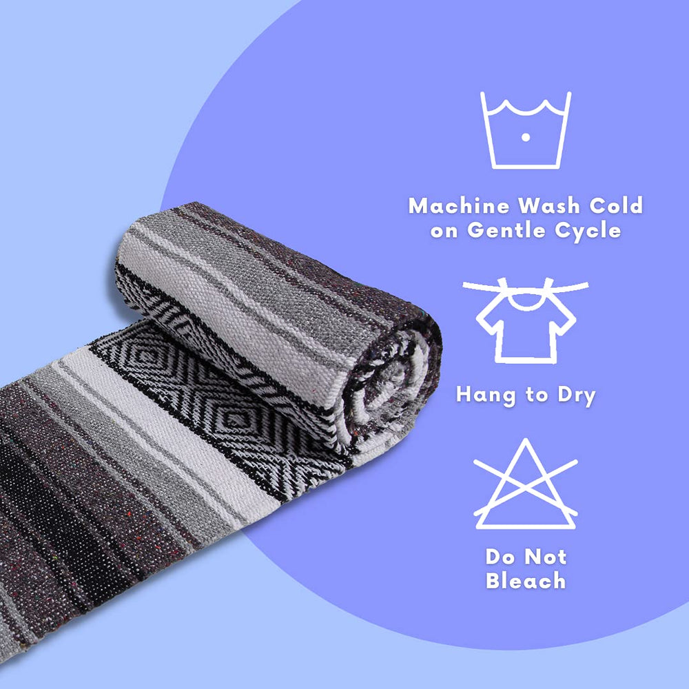 El Paso Designs Mexican Yoga Blanket displayed on a yoga mat