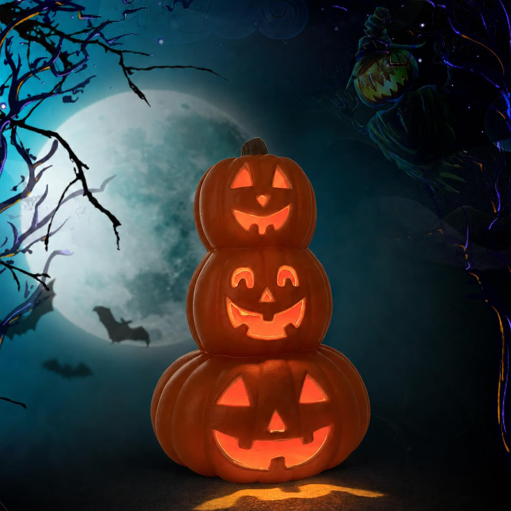 Evelyne pumpkin tower on a porch tabletop during Halloween