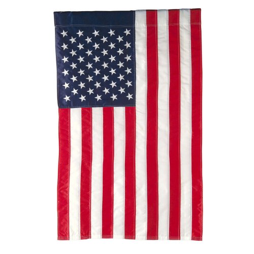 Evergreen Flag American Flag displayed in garden