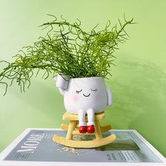 EylbKey Cute Rocking Chair Head Planter side view with drainage hole