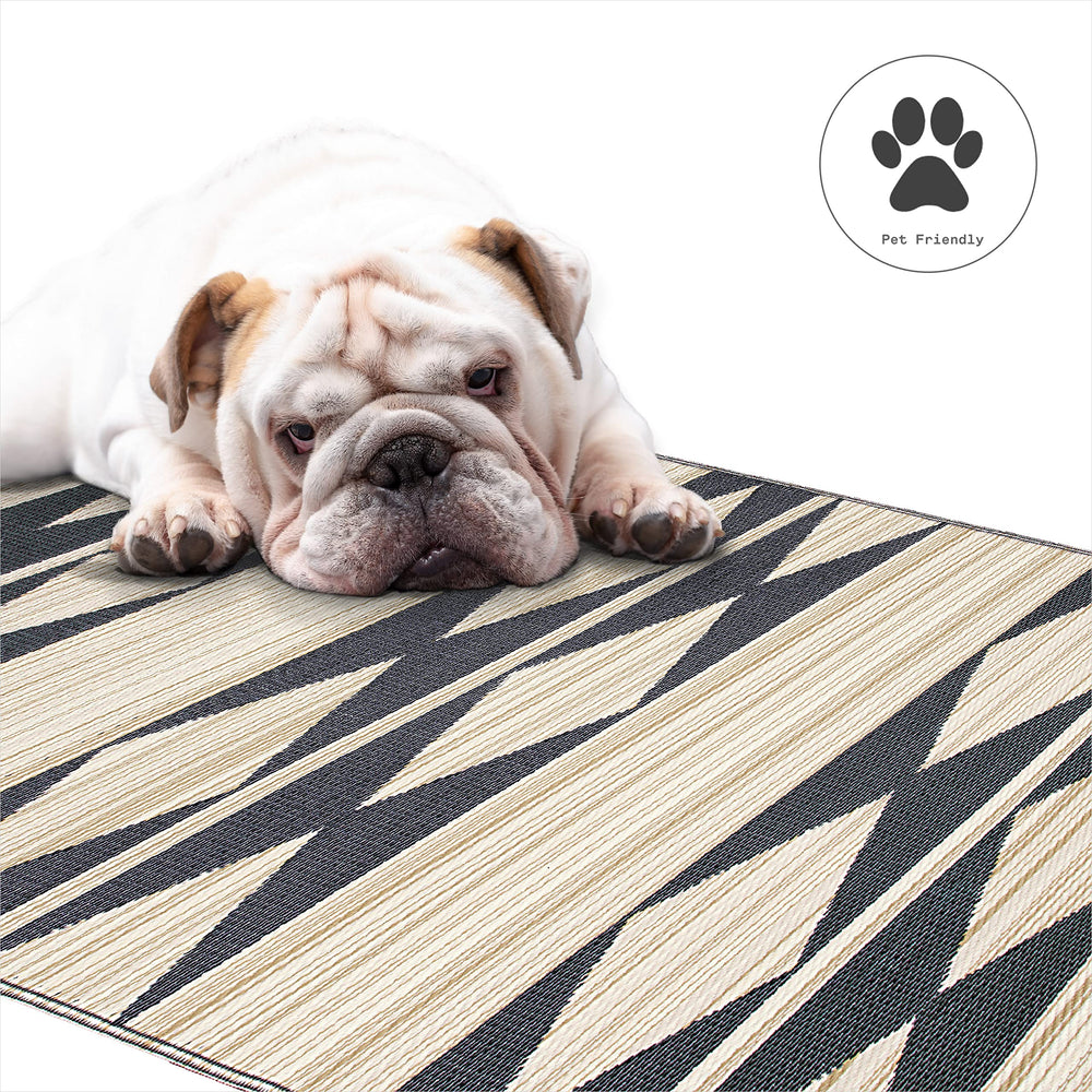 FAB HAB Outdoor Rug displaying waterproof feature with water on surface