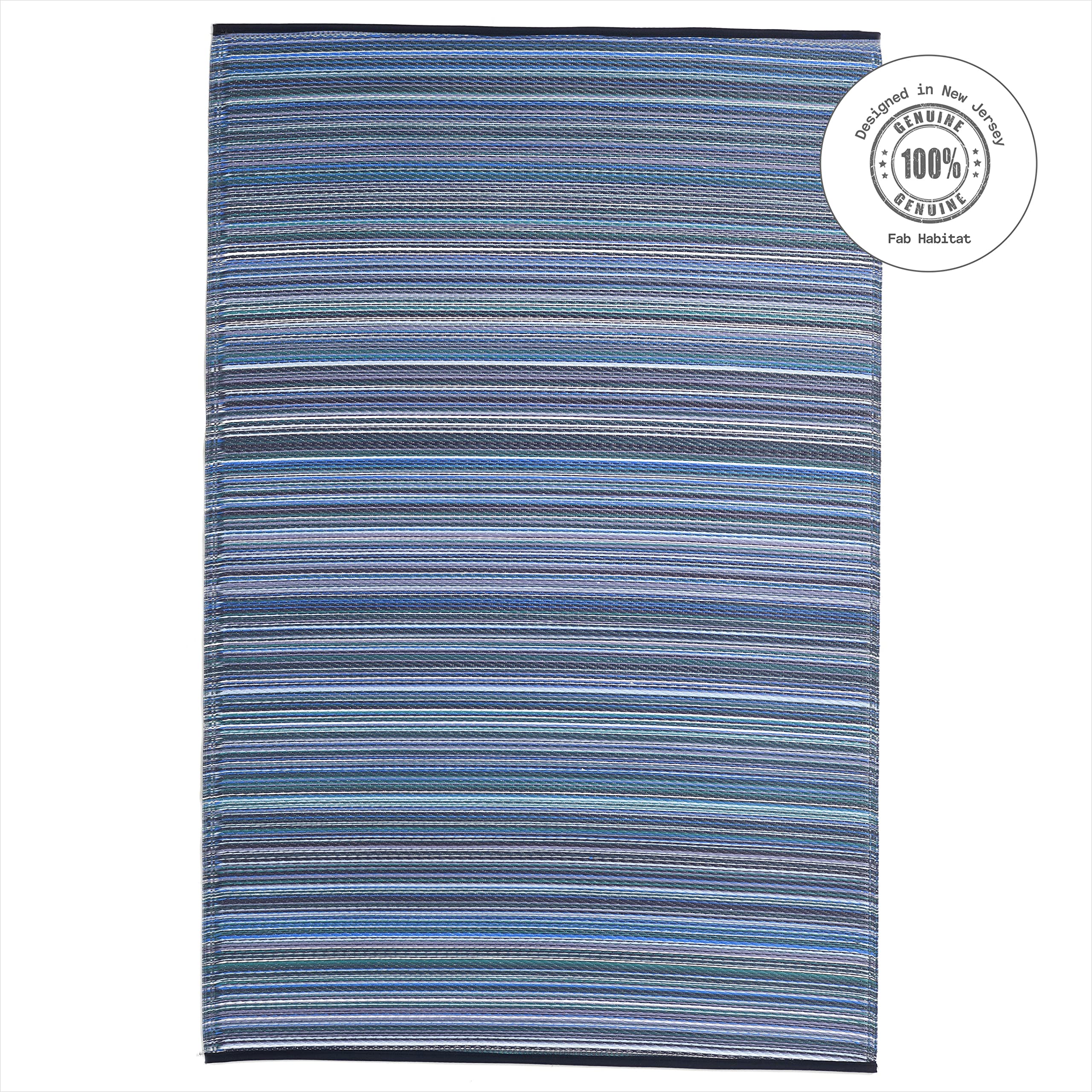 FAB HAB Outdoor Rug in outdoor patio setting