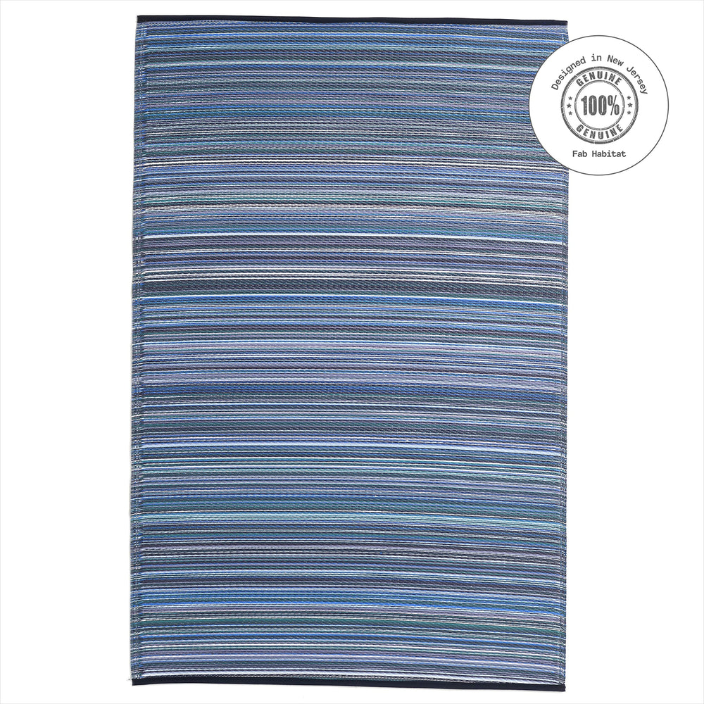 FAB HAB Outdoor Rug in outdoor patio setting