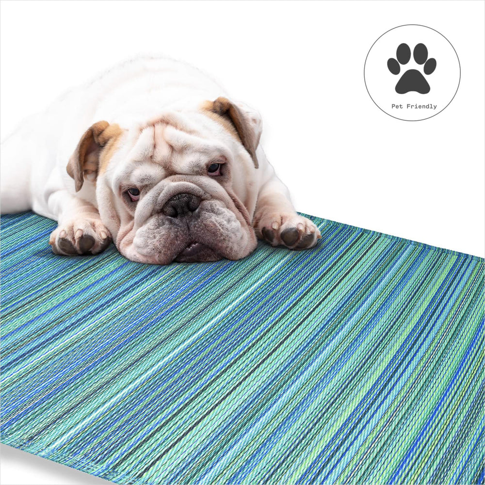 FAB HAB Outdoor Rug in use beside a pool area