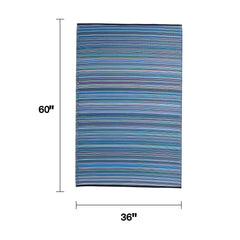 FAB HAB Outdoor Rug rolled with elastic bands