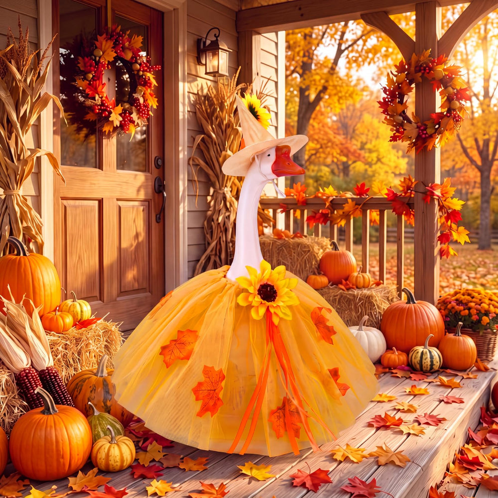 Fall porch goose costume on a statue next to autumn leaves