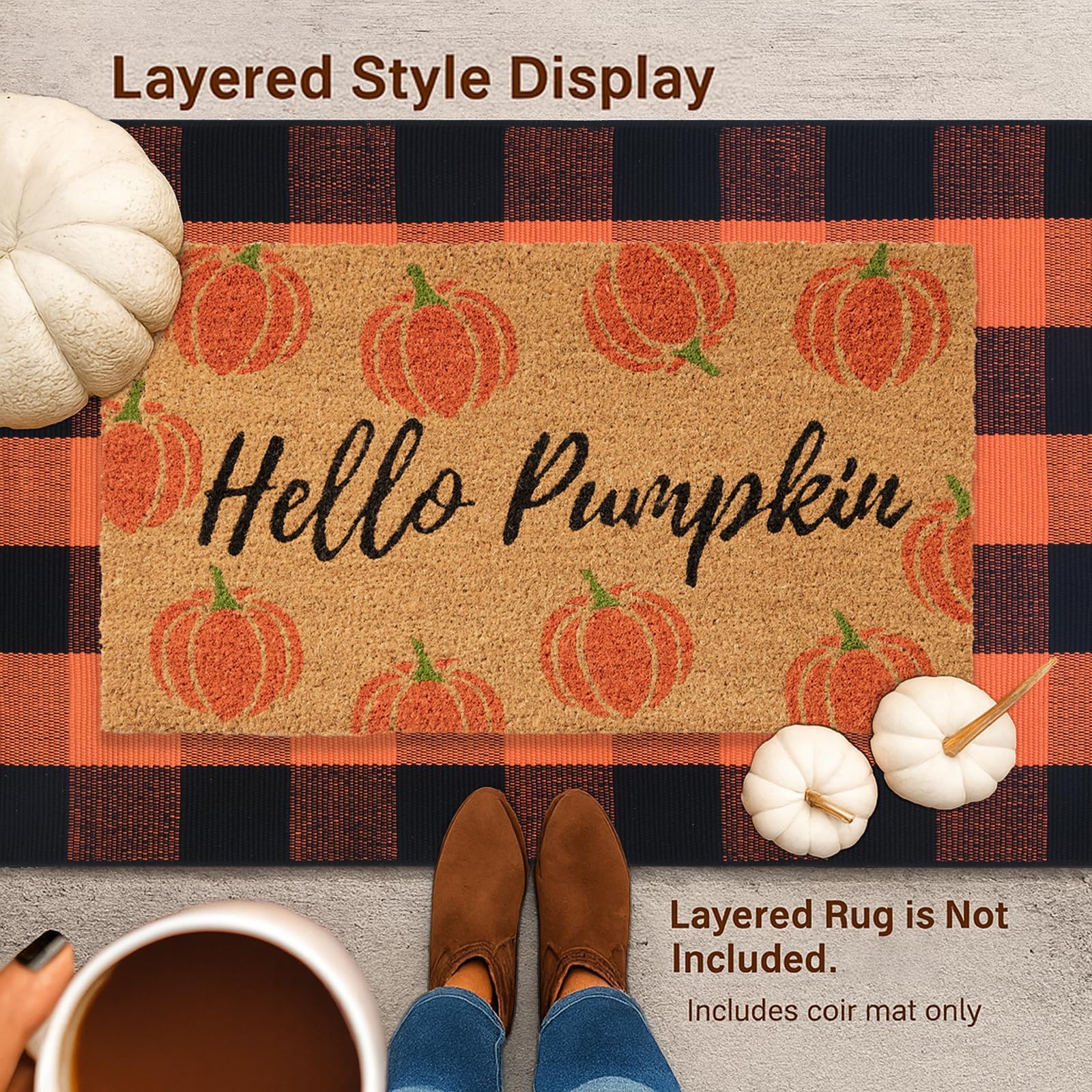Fallovea Hello Pumpkin Coir Doormat against a door