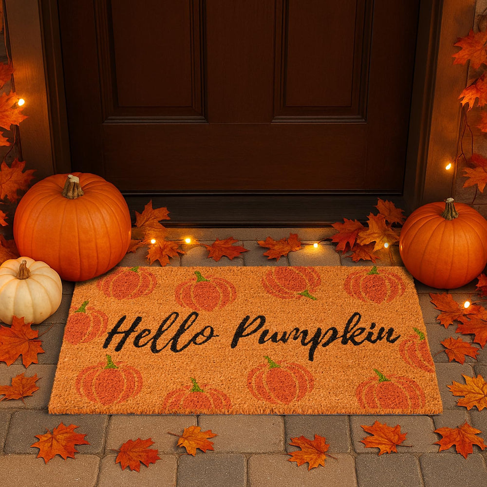 Fallovea Hello Pumpkin Coir Doormat in entryway setting