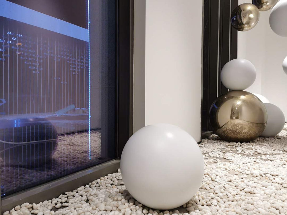 FANTIAN pebbles displayed in a decorative bowl