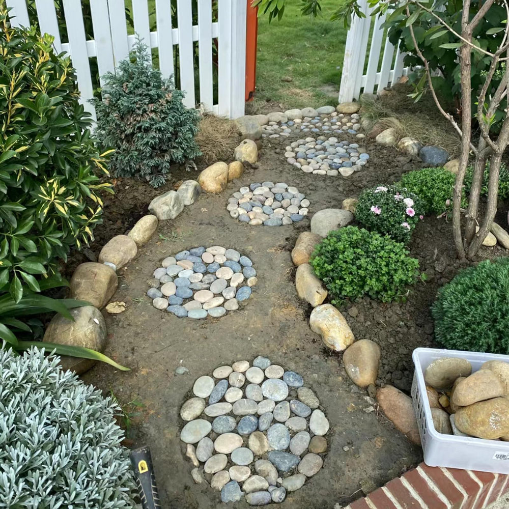 FANTIAN river rocks in a decorative garden setup