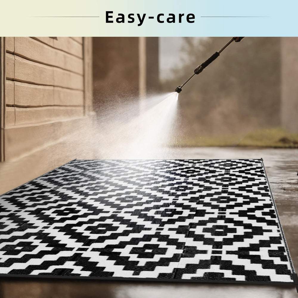 Favoyard Outdoor Rug 9x12 ft black and white folded