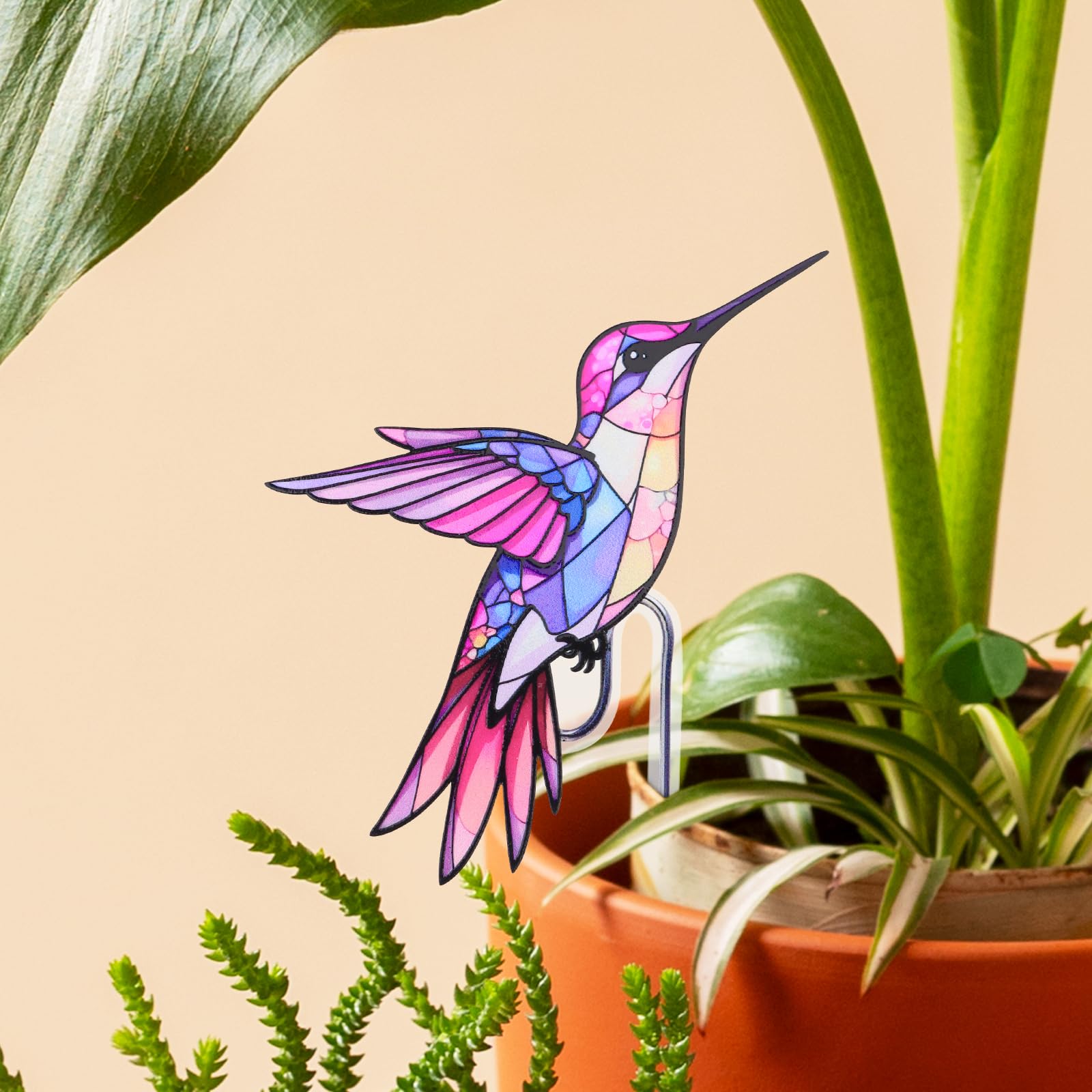 FBBP Hummingbird Planter in a vibrant outdoor setting