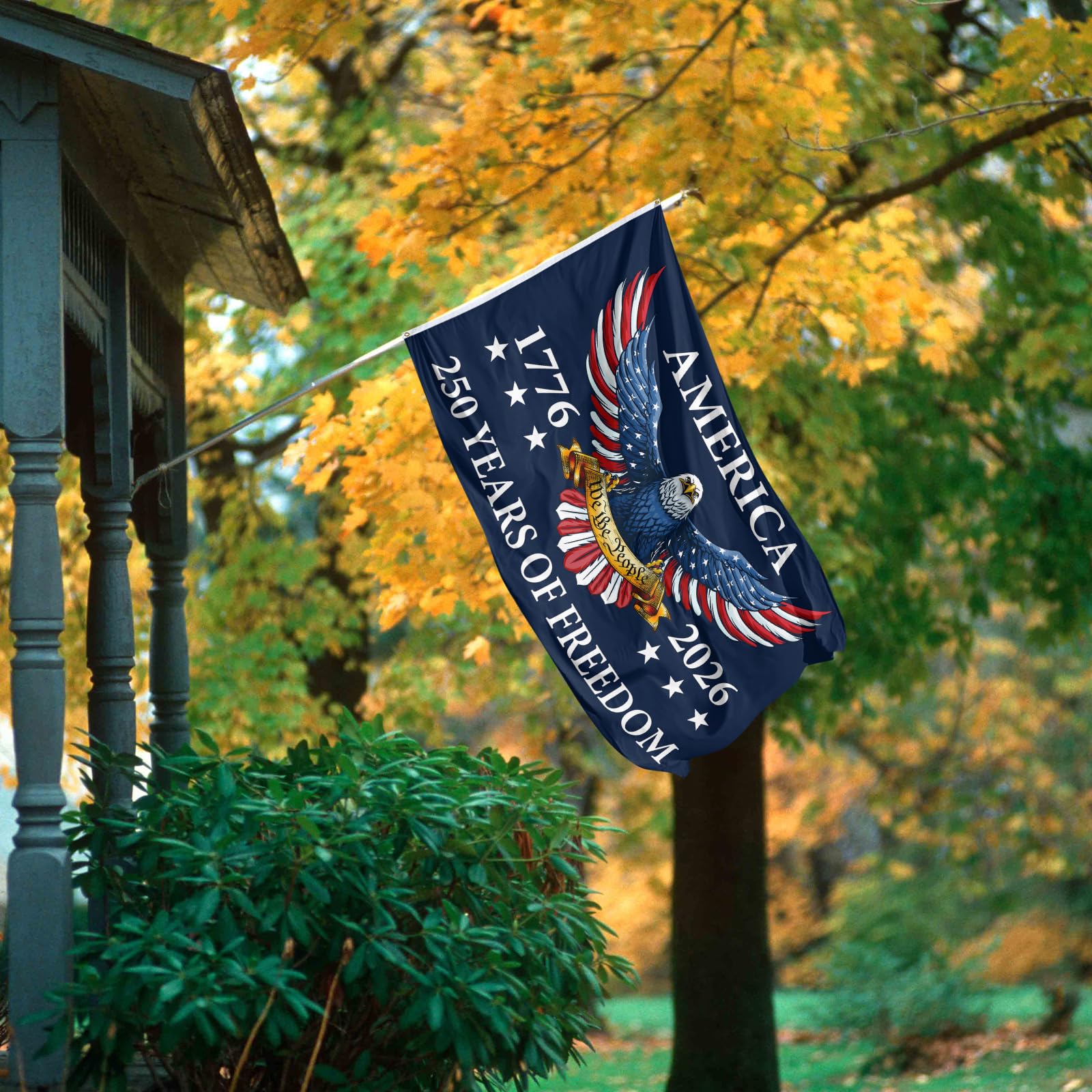 Feeniss 250th Birthday Flag in a garden setting