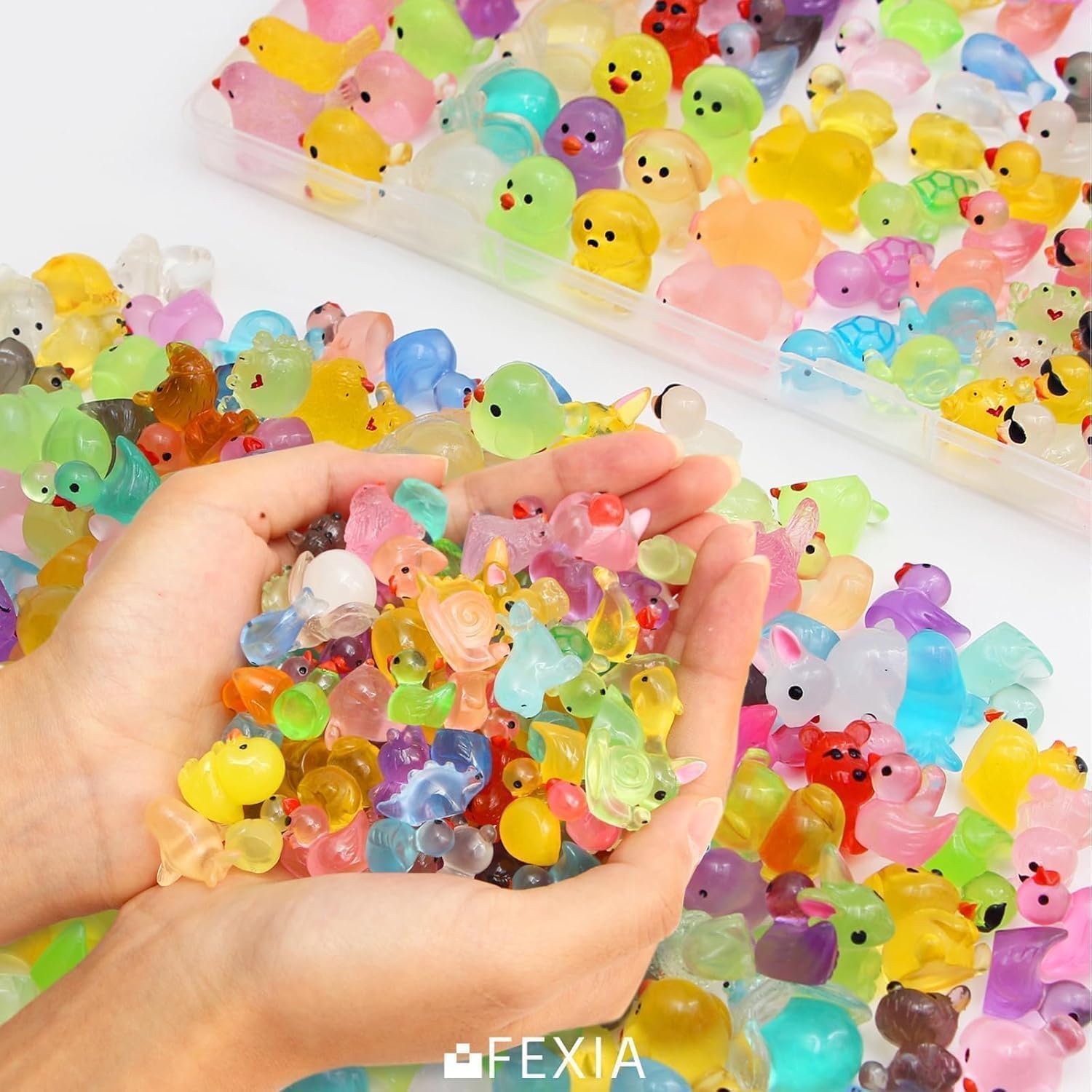 FEXIA mini resin animals displayed in an aquarium