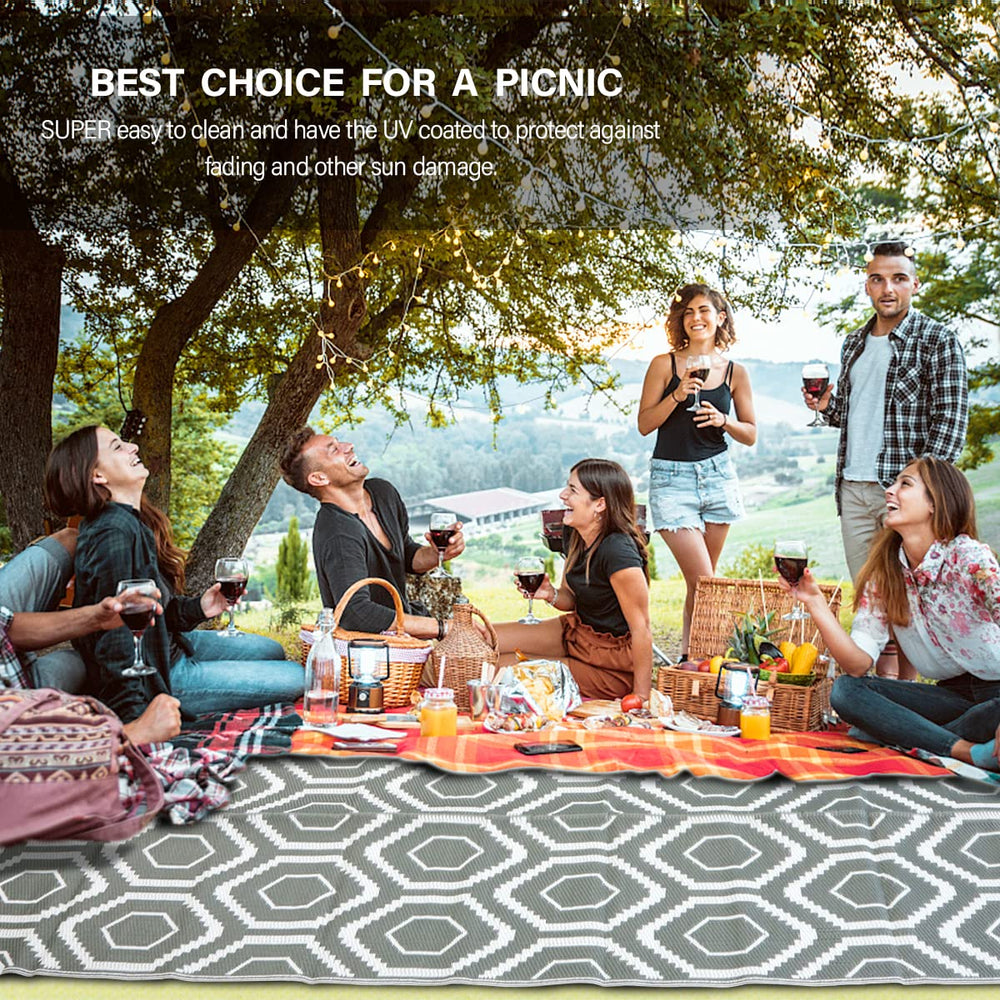 fifame outdoor rug at a beach setting with family
