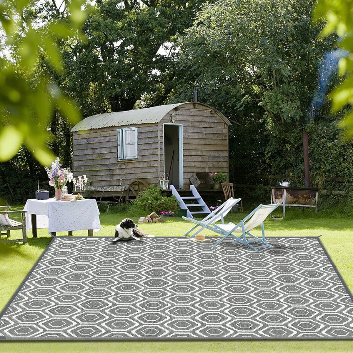 fifame outdoor rug displayed in a garden