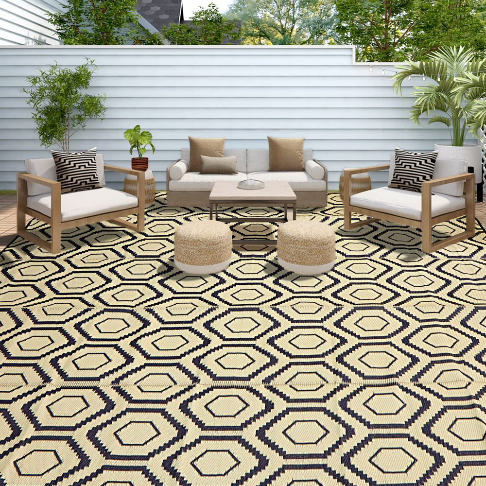 fifame outdoor rug on the beach with family