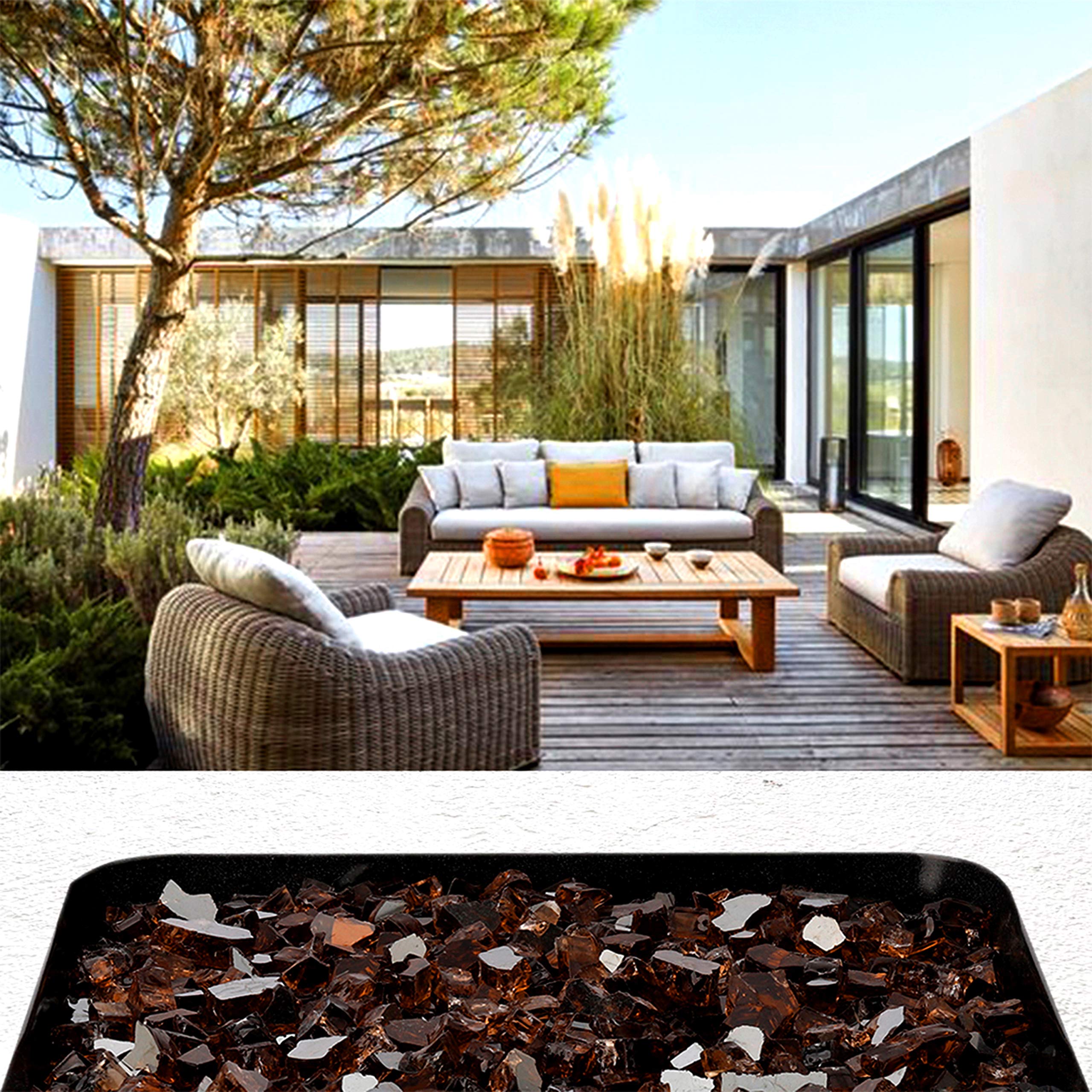 Fire pit filled with reflective copper fire glass