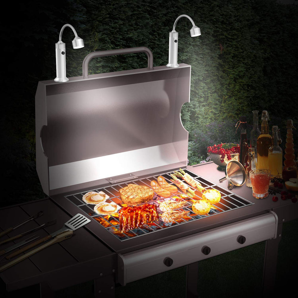 FIREOR grilling light on a grill in the evening