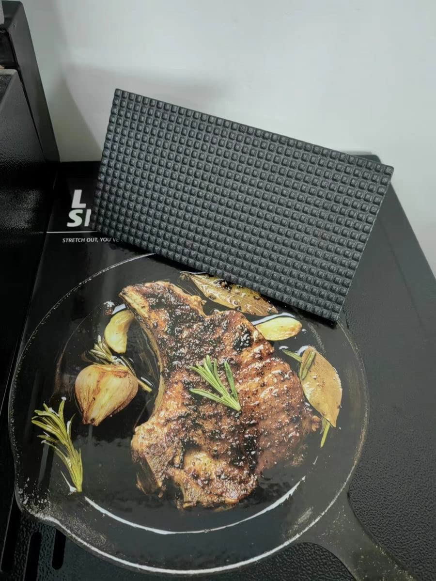 Firsgrill Grill Press on a barbecue with steaks