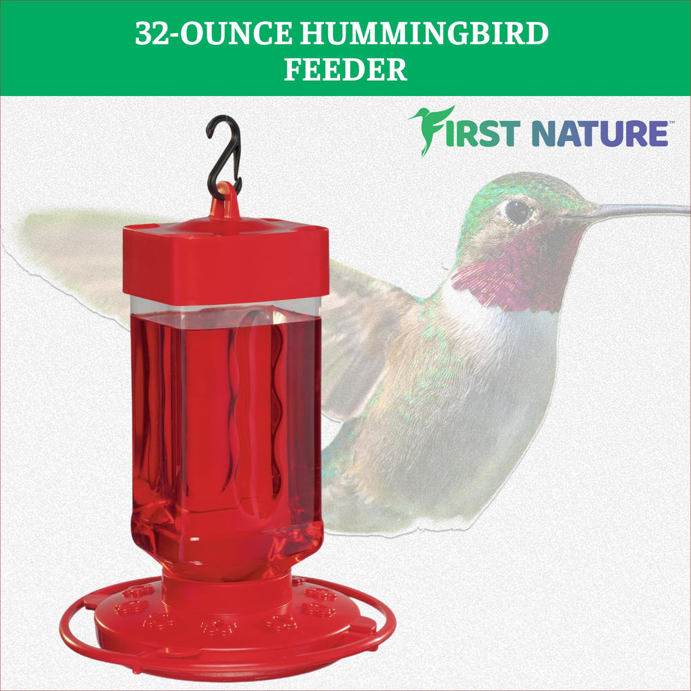 FIRST NATURE Hummingbird Feeder hung from a garden hook