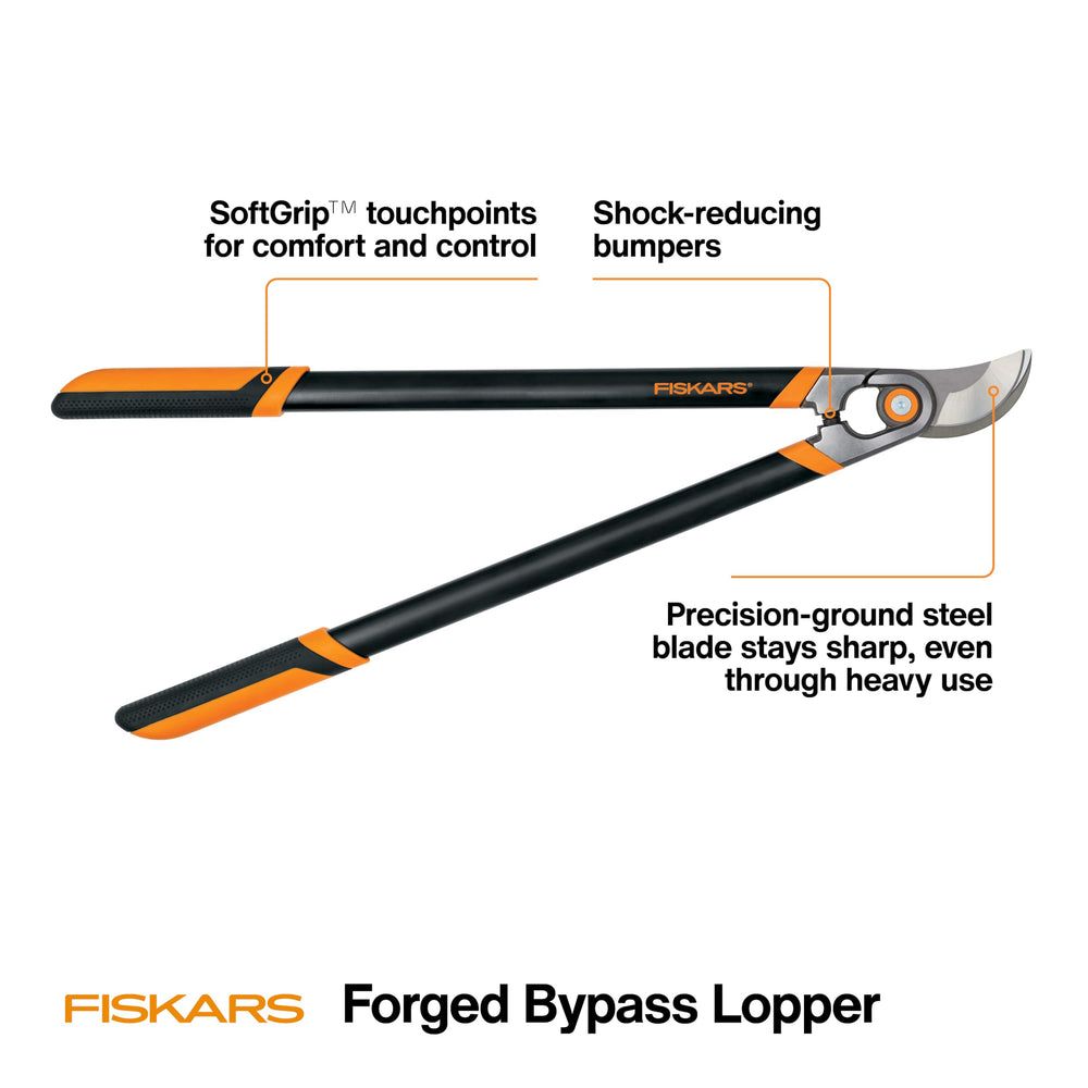 Fiskars 30-inch loppers cutting through a thick branch
