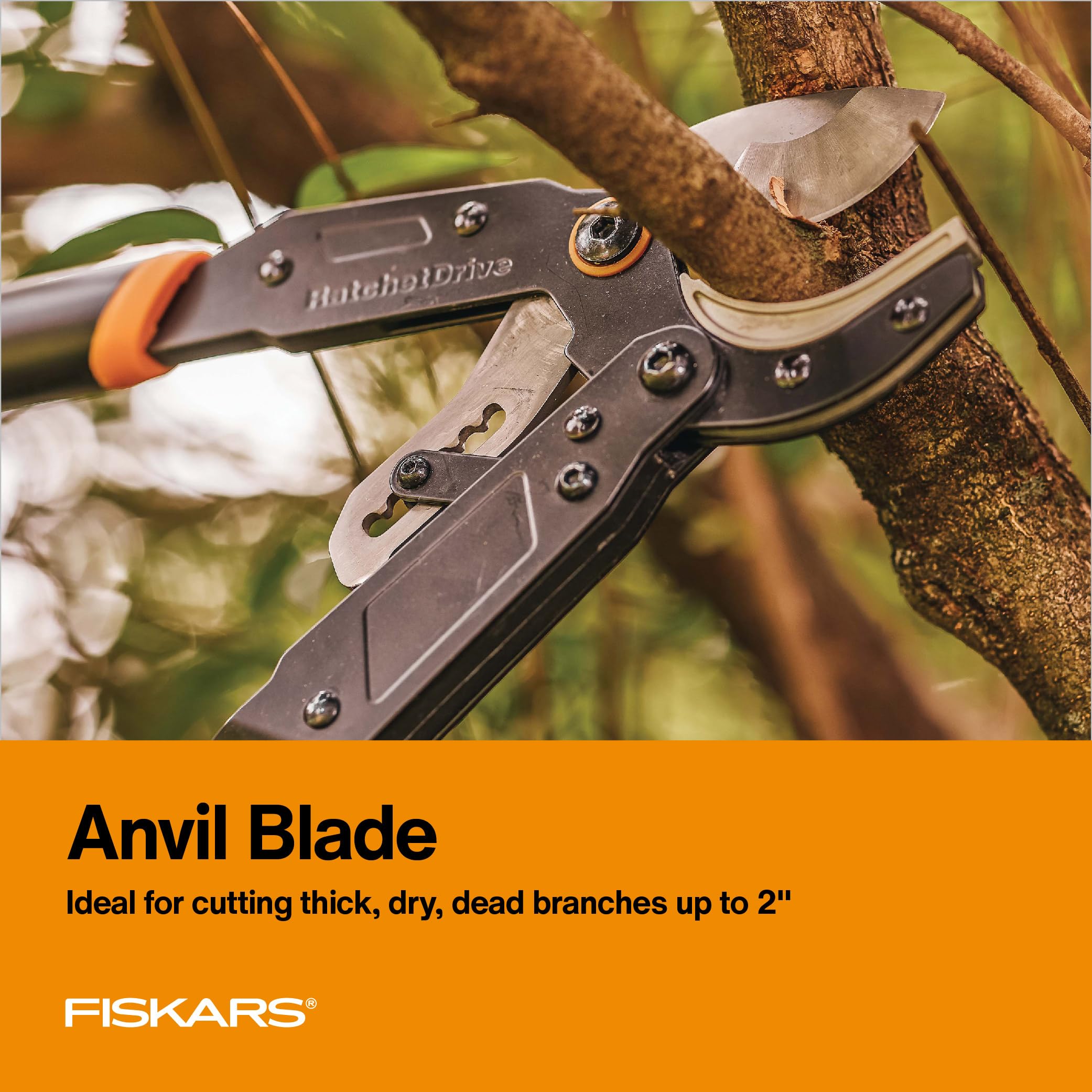 Fiskars 32 inch Lopper in use cutting branch