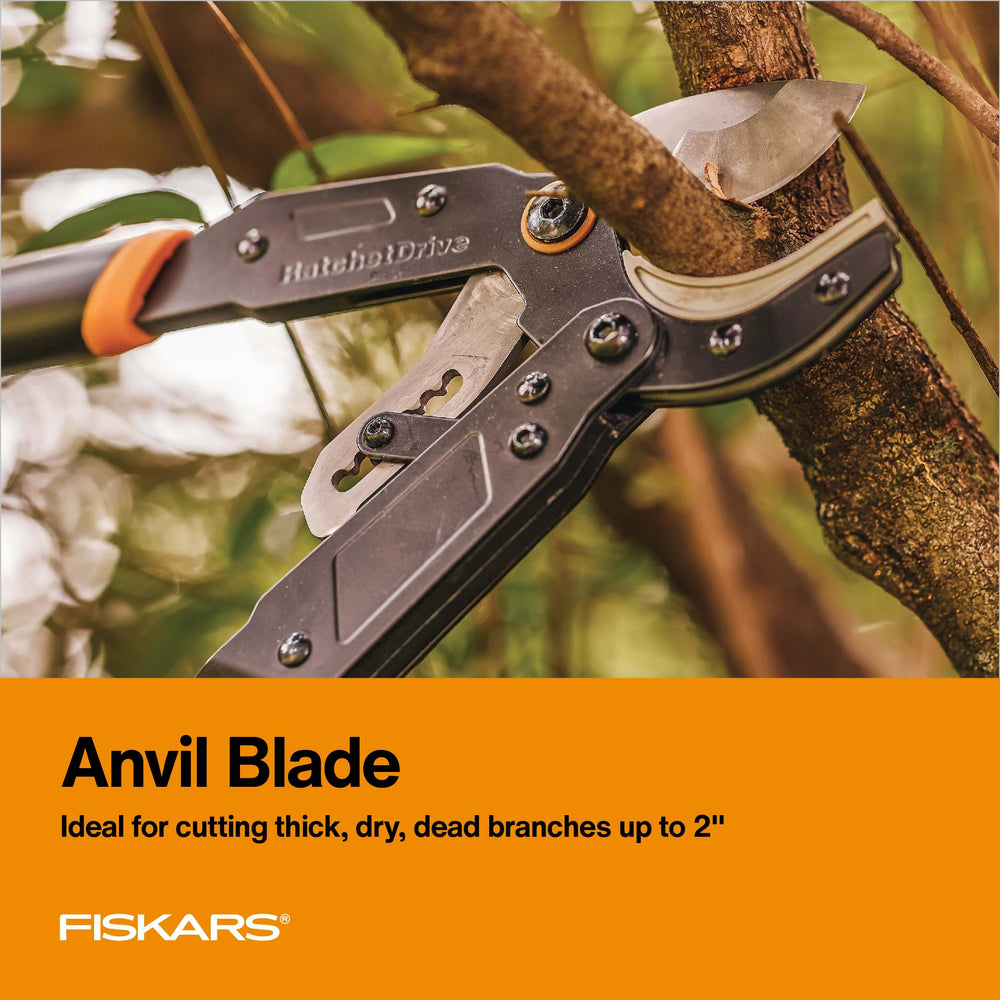Fiskars 32 inch Lopper in use cutting branch