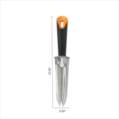 Fiskars garden knife resting on soil in a garden setting