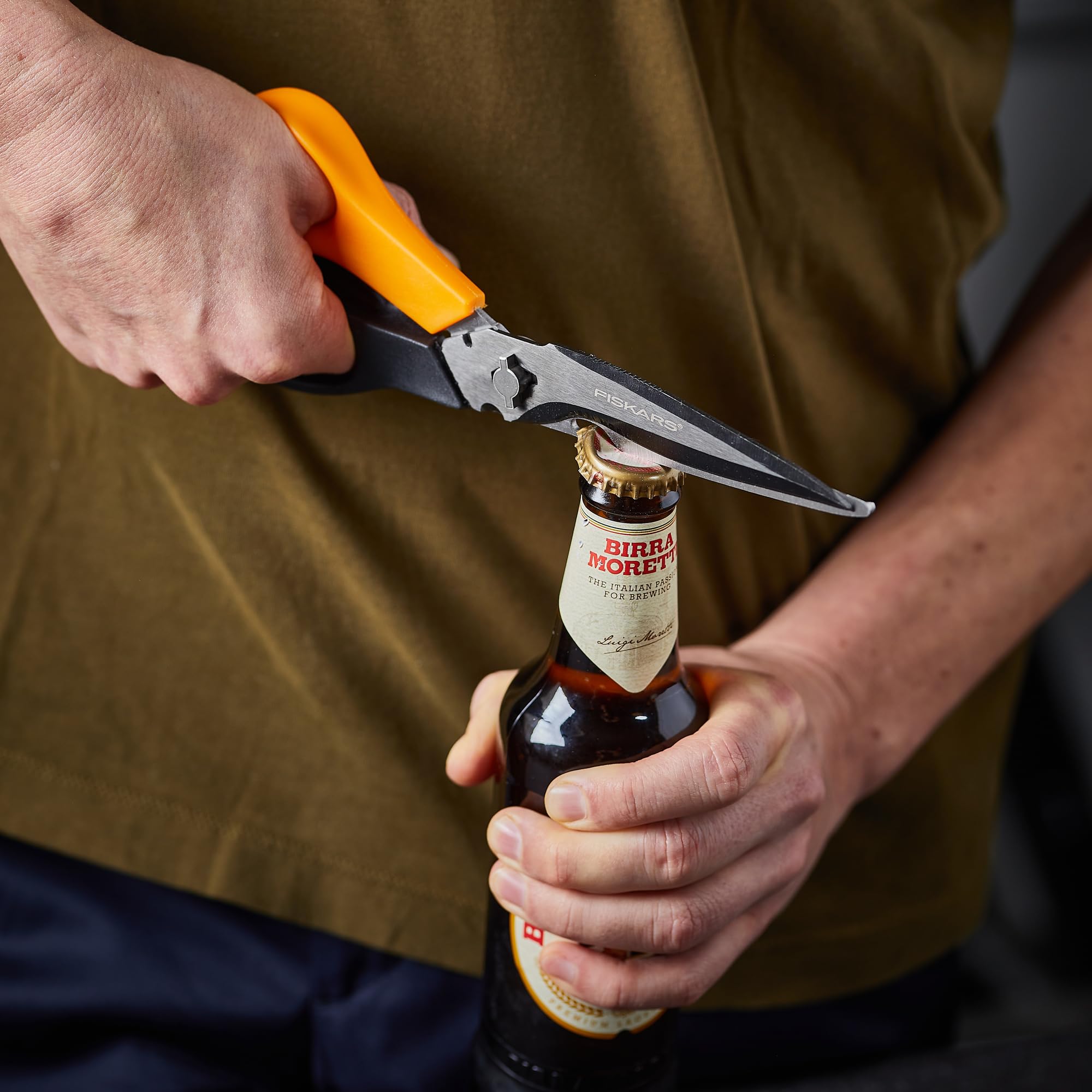 Fiskars garden scissors with pointed awl tip and bottle opener