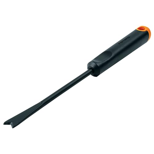 Fiskars Hand Weeder in outdoor garden setting