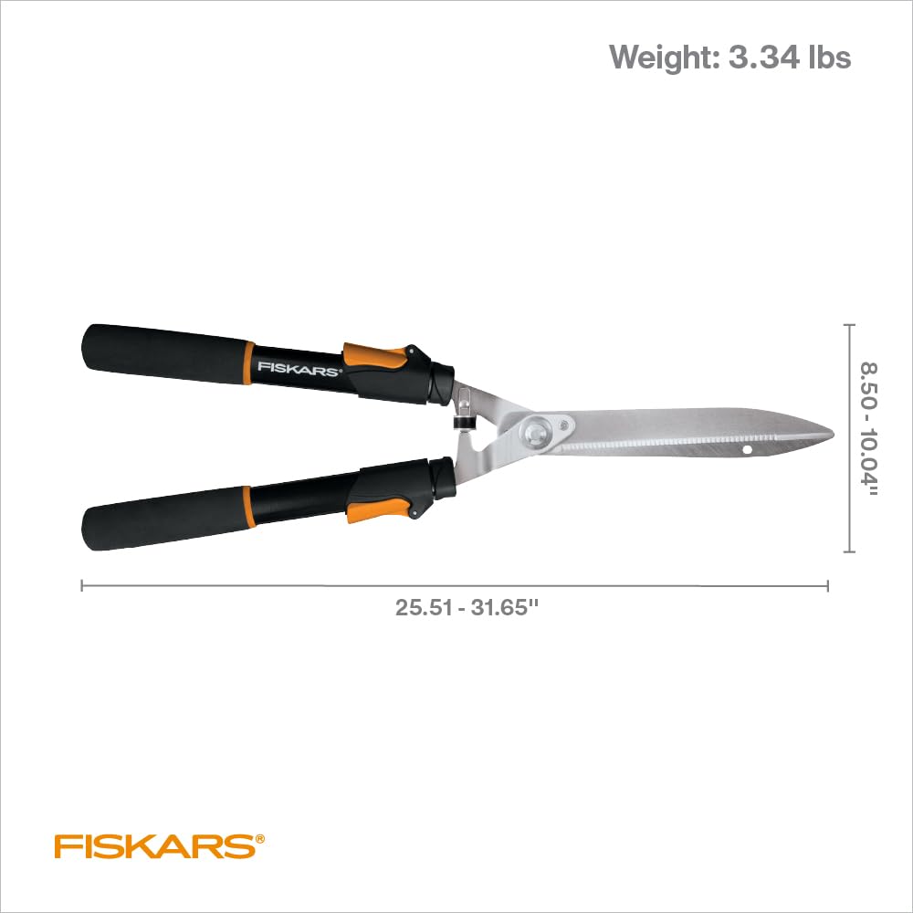 Fiskars hedge shears displayed with vibrant garden backdrop