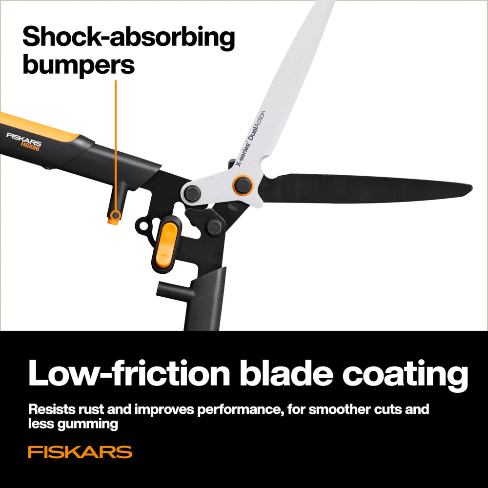 Fiskars hedge shears placed on a garden table with tools