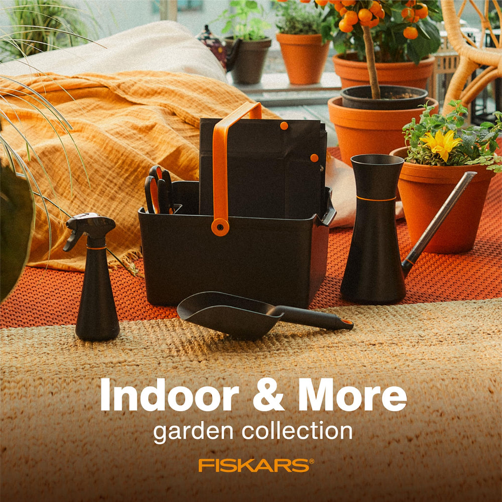 Fiskars Indoor Watering Can displayed with indoor plants