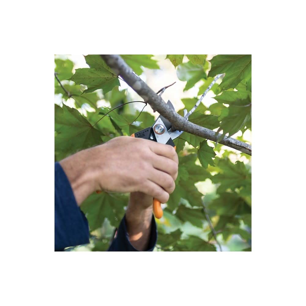 Fiskars Pro pruning shears showing multiple grip positions on handle