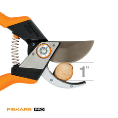 Fiskars pruning shears in use on garden plants