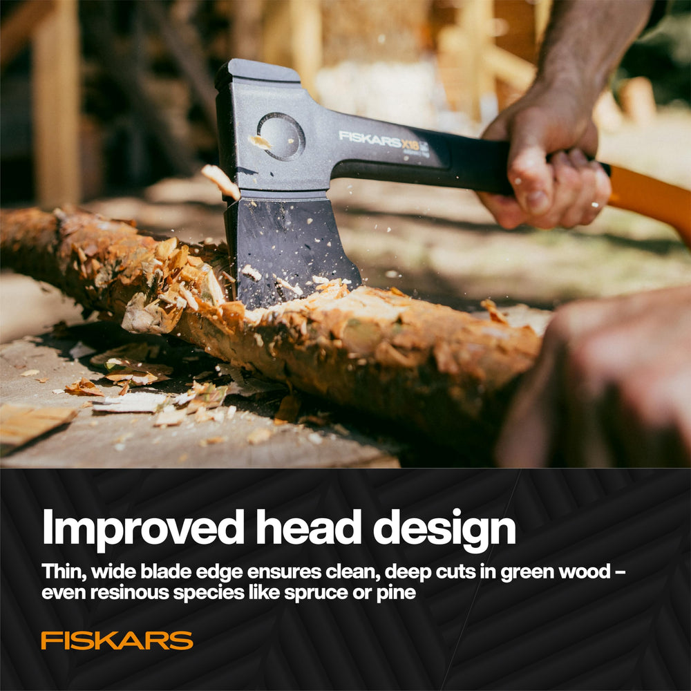 Fiskars X18 axe in use chopping wood