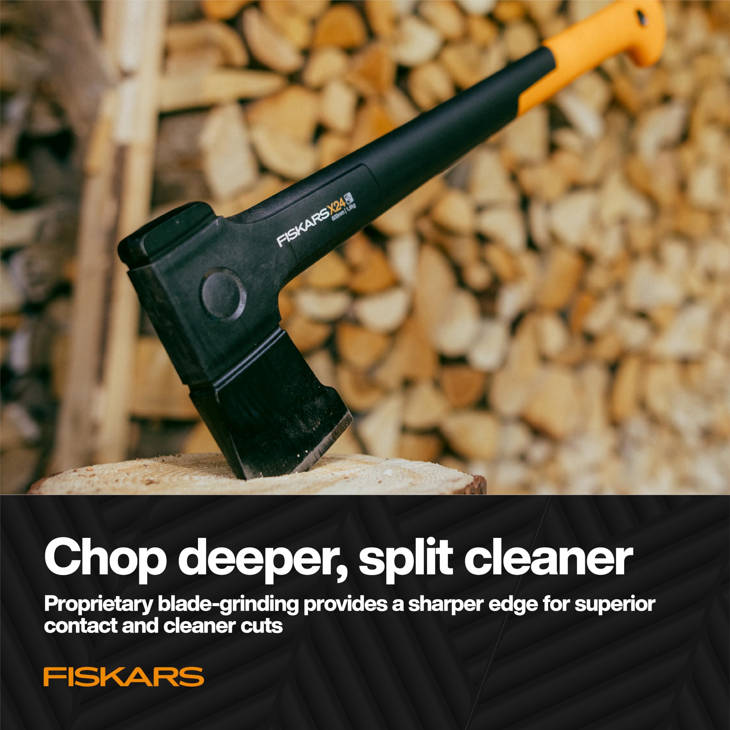 Fiskars X24 axe against a woodpile background